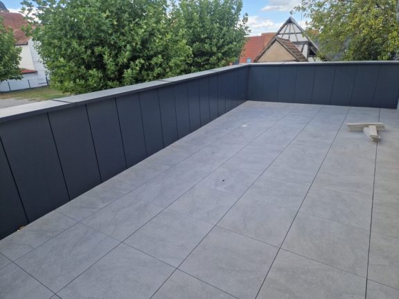 Réfection d'une toiture-terrasse avec dalles sur plots